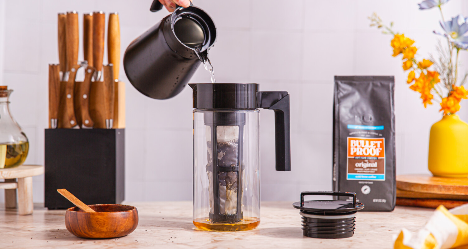filling a cold brew coffee maker