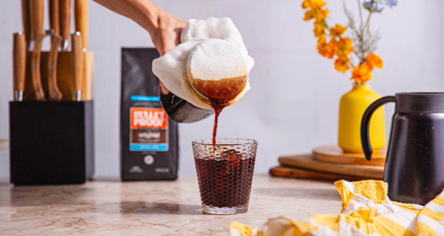 cold brew poured through cheesecloth