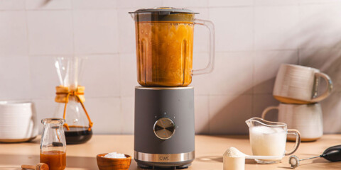 person making a blended coffee drink
