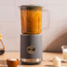 person making a blended coffee drink