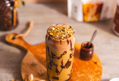 closeup of dubai chocolate protein iced latte
