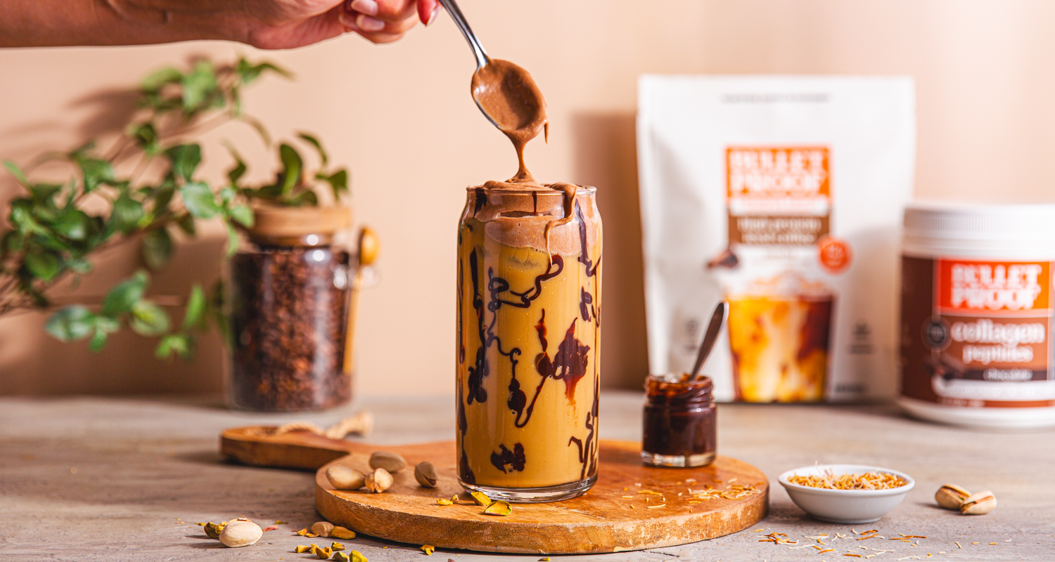 topping dubai chocolate protein iced latte with collagen cold foam