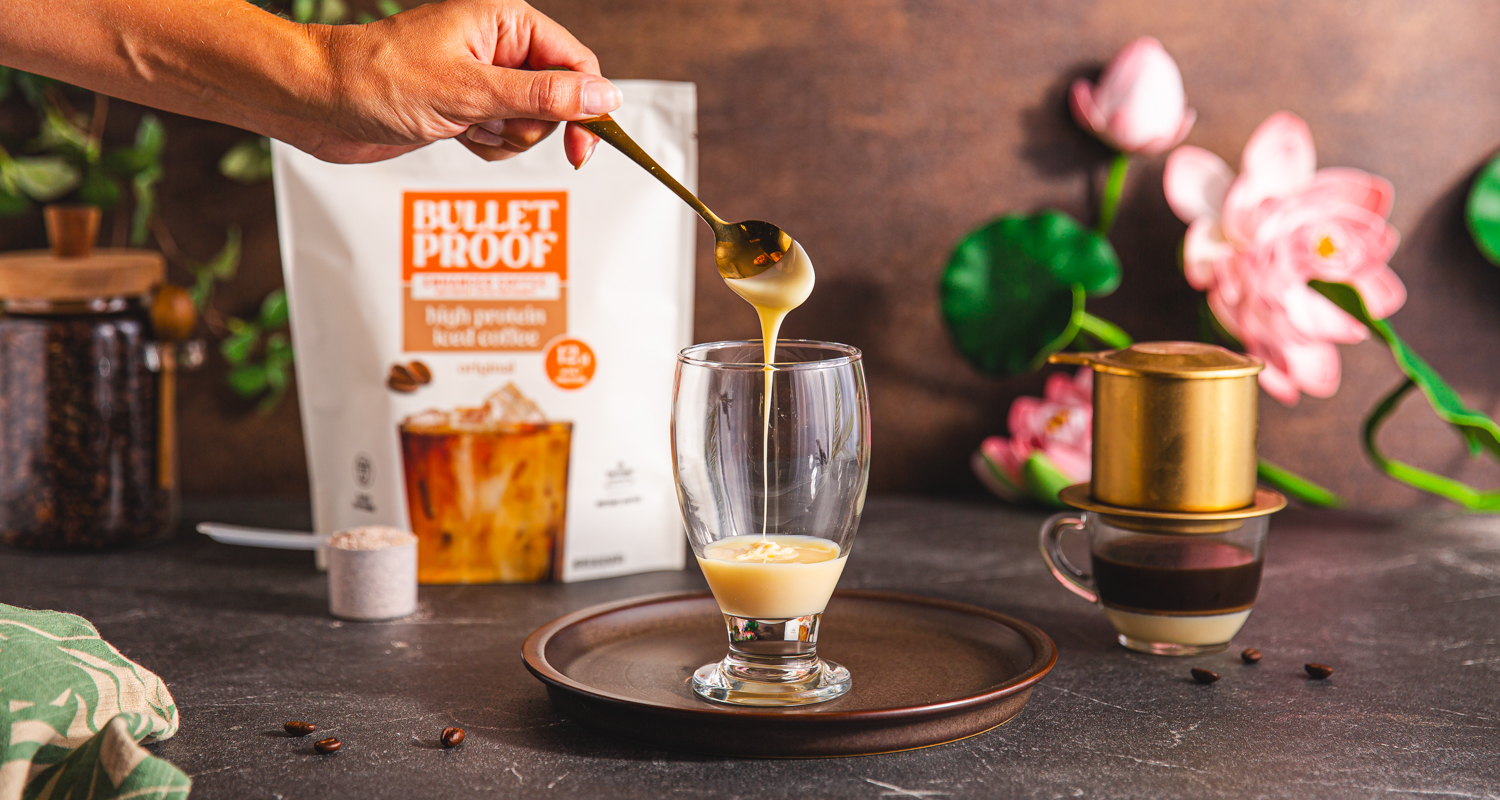 condensed milk dripping into glass
